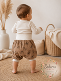 kurze Pumphose dunkelbeige Größe 68/74 mit Dino -Muster mit hellbeige Bündchen